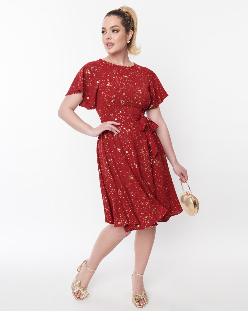 Front of a model wearing a size L Unique Vintage Deep Red & Gold Star Swing Dress in Red, gold stars by Unique Vintage. | dia_product_style_image_id:306090
